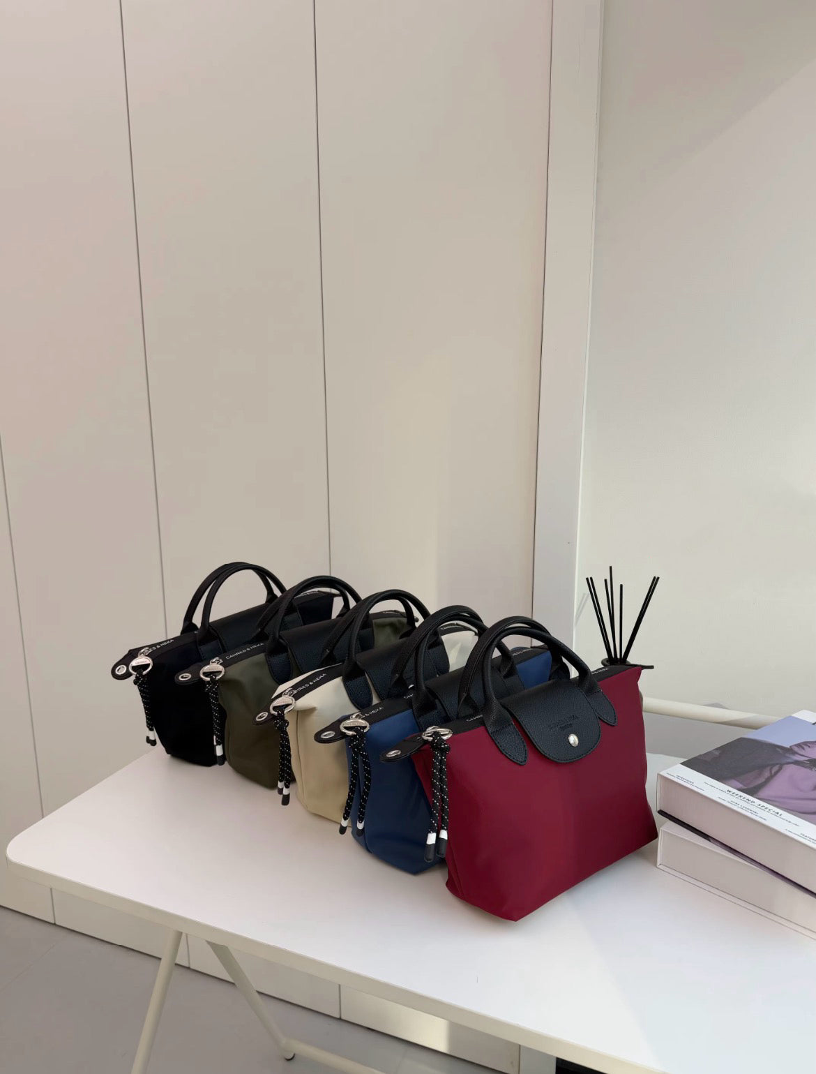 The Aria Dumpling Satchel Mixed Nylon & Leather Tote